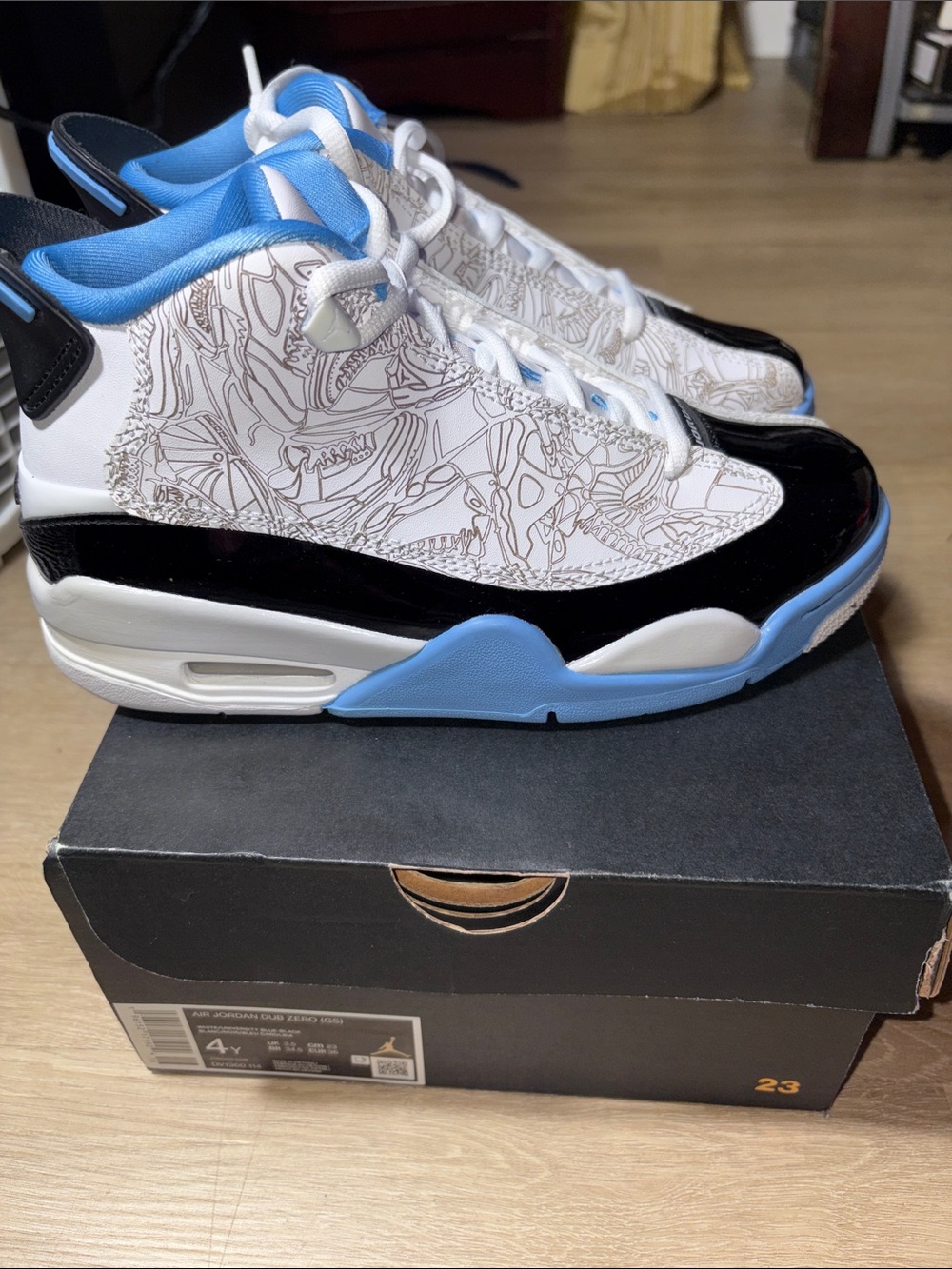 Jordan Women's White, Black & Light Blue Graphic Sneakers